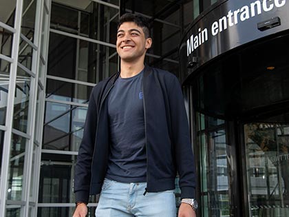 Mohamed at campus entrance